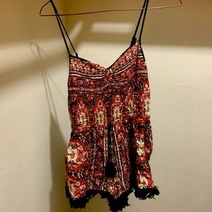 Patterned shorts romper.